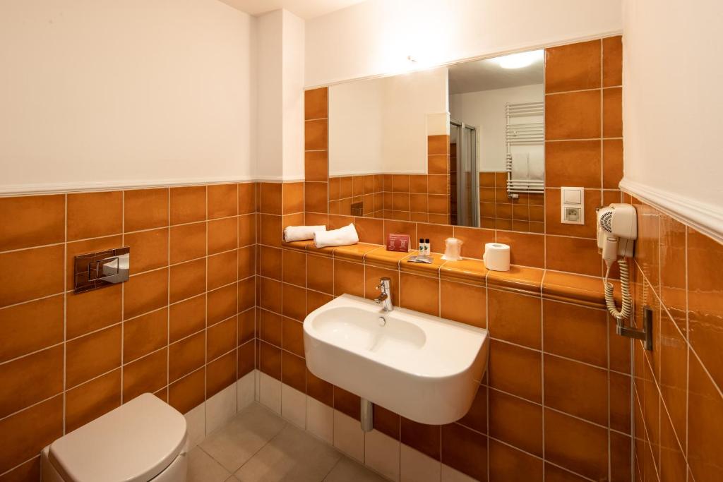 Kúpeľňa v ubytovaní Hotel Słoneczny Młyn