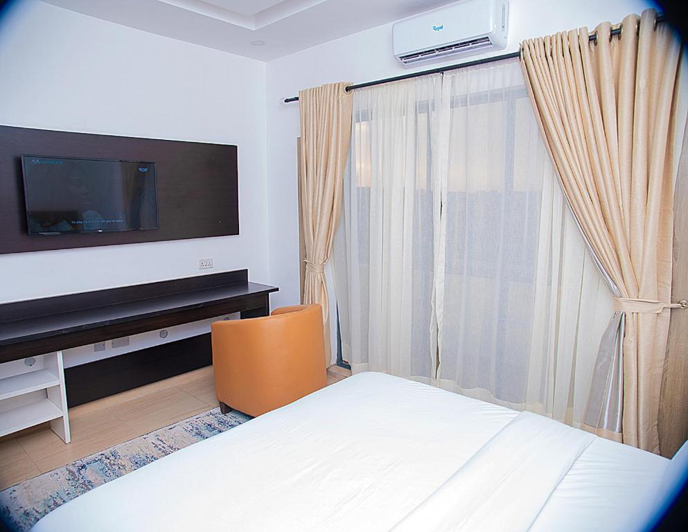 Postel nebo postele na pokoji v ubytování Hotel Capitol