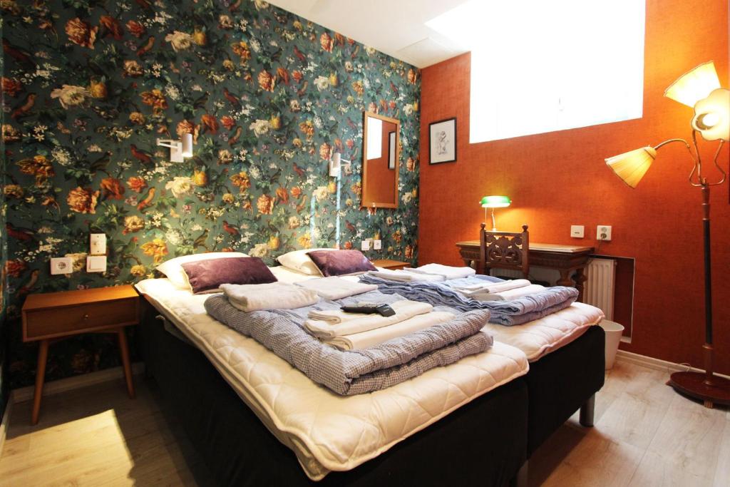 Postel nebo postele na pokoji v ubytování Skanstulls Boutique Hostel
