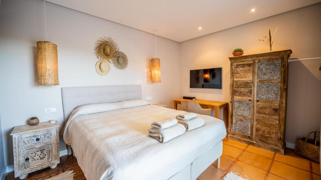 Postel nebo postele na pokoji v ubytování Villa El Mirador Uno