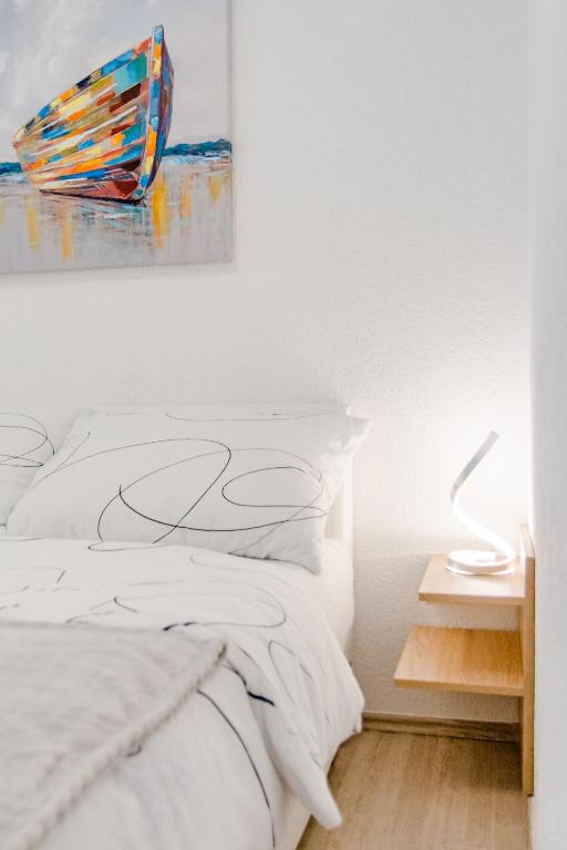 Posteľ alebo postele v izbe v ubytovaní Apartment Eli