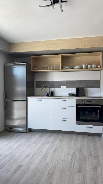 Kuchyň nebo kuchyňský kout v ubytování Apartma Vovk