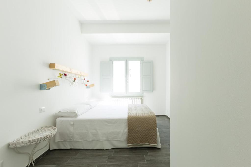 Postel nebo postele na pokoji v ubytování Tangram House