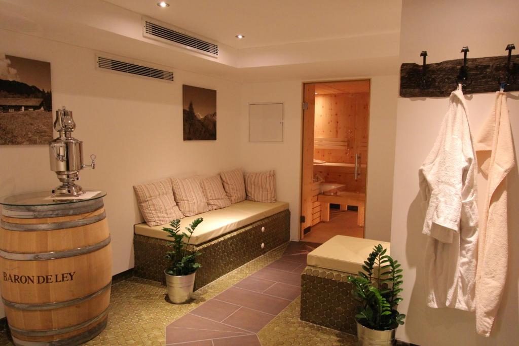 Postel nebo postele na pokoji v ubytování Hotel Tirolerhof