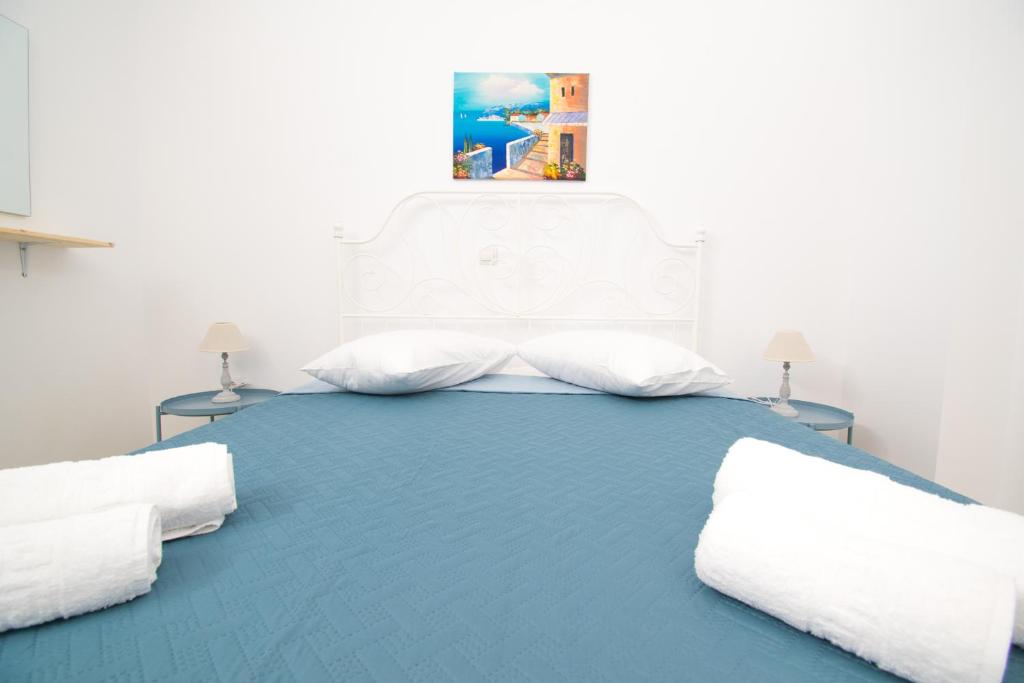 Postel nebo postele na pokoji v ubytování CHAMBRE BLANCHE