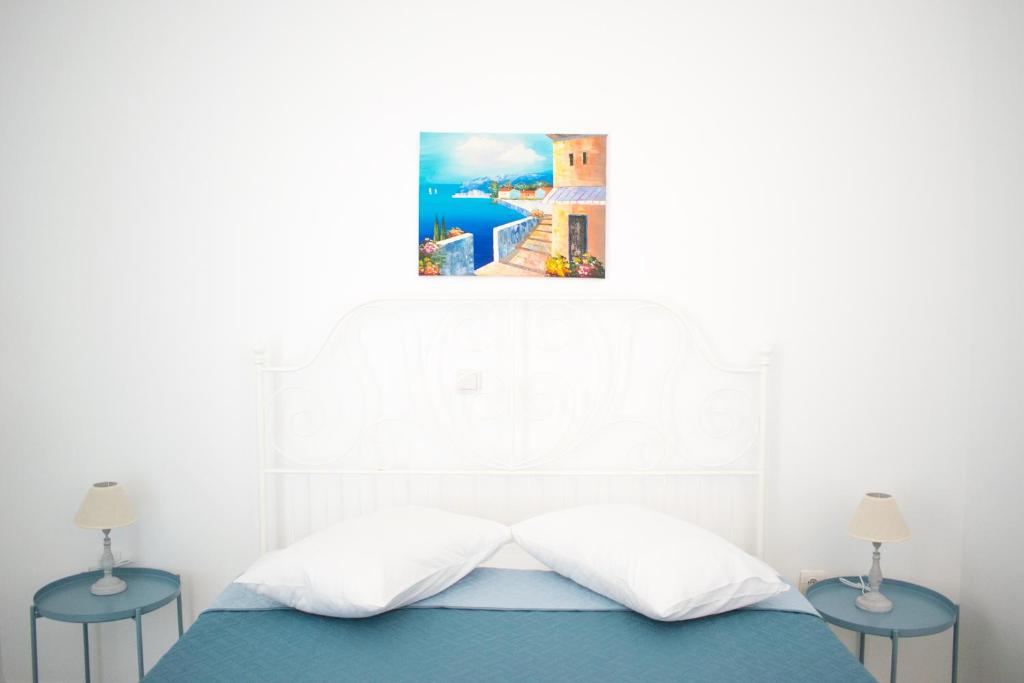 Postel nebo postele na pokoji v ubytování CHAMBRE BLANCHE
