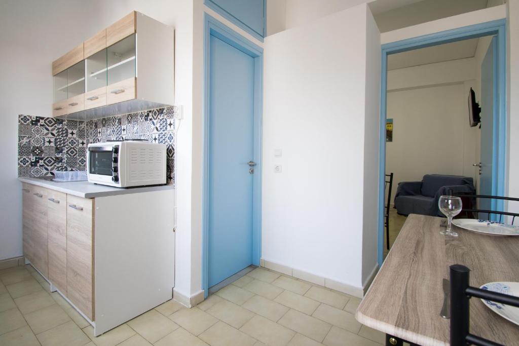 Kuchyň nebo kuchyňský kout v ubytování CHAMBRE BLANCHE