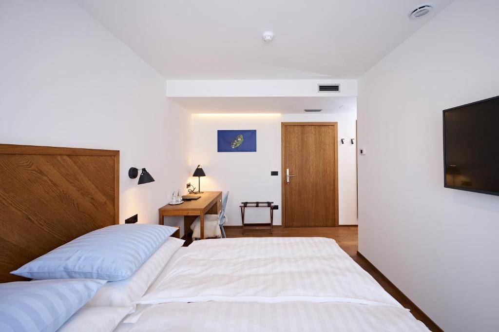 Postel nebo postele na pokoji v ubytování Hiša Ančka, Šenčur - 3 min to the Airport