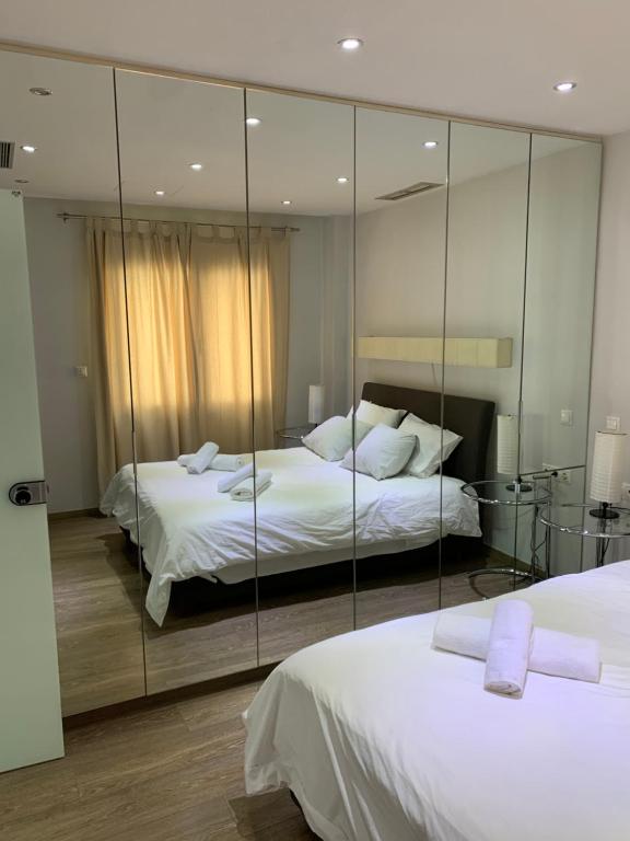 Posteľ alebo postele v izbe v ubytovaní Olvias Apartment
