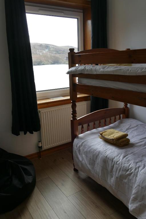 Postel nebo postele na pokoji v ubytování Wallace Lodge