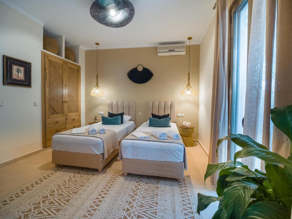 Postel nebo postele na pokoji v ubytování Carmena Residence