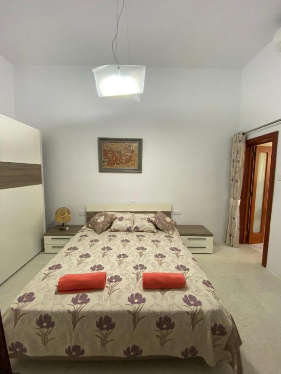 Postel nebo postele na pokoji v ubytování Magical Casalgo House