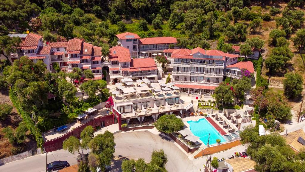 an aerial view of a resort with a swimming pool at Valtos Beach Hotel in Parga