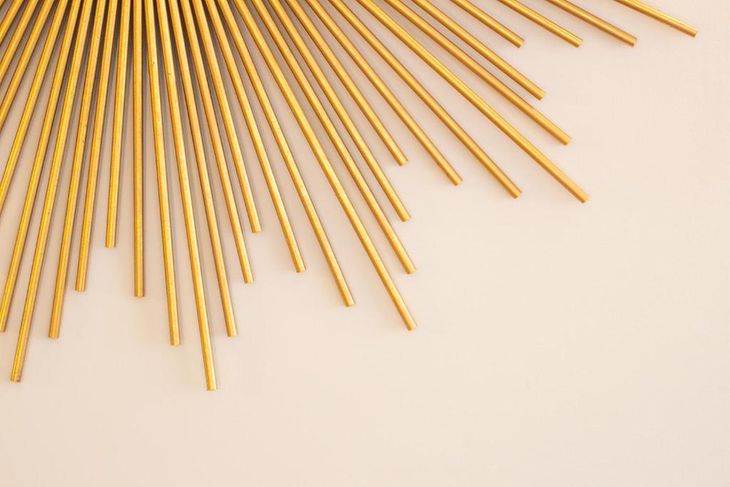 a group of wooden straws on a white background at Le Gamaritz in Biarritz