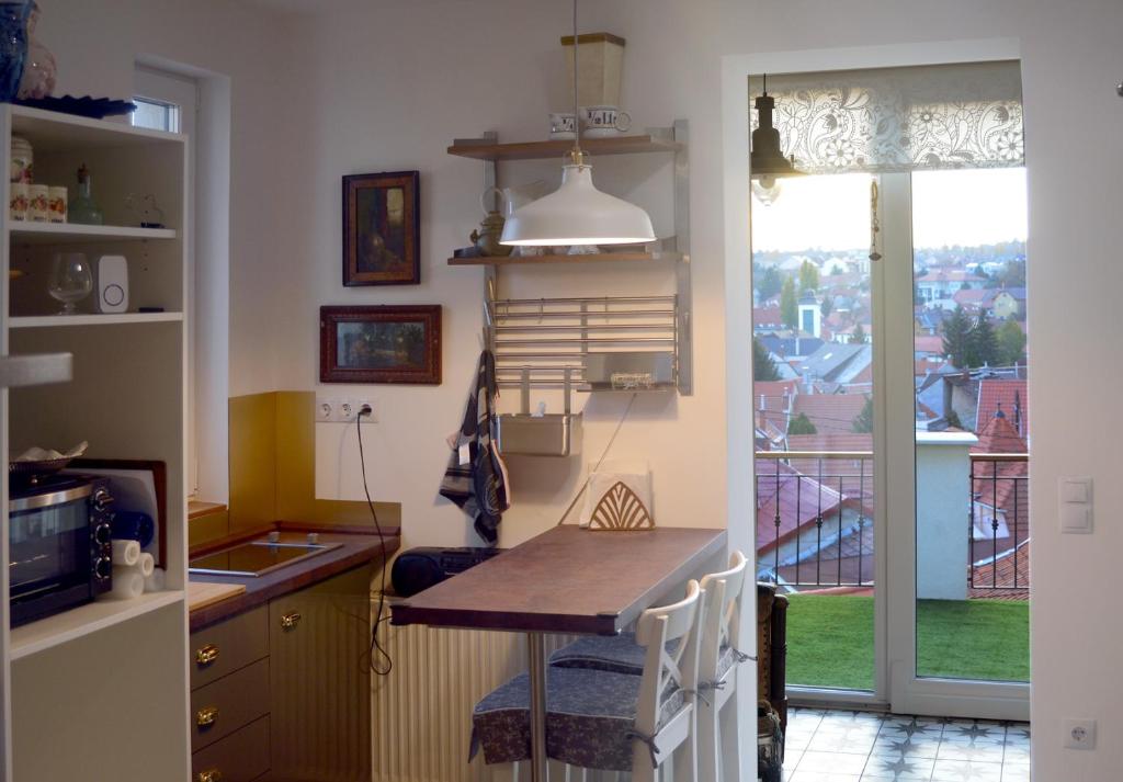 Posedenie v ubytovaní Fília Apartman