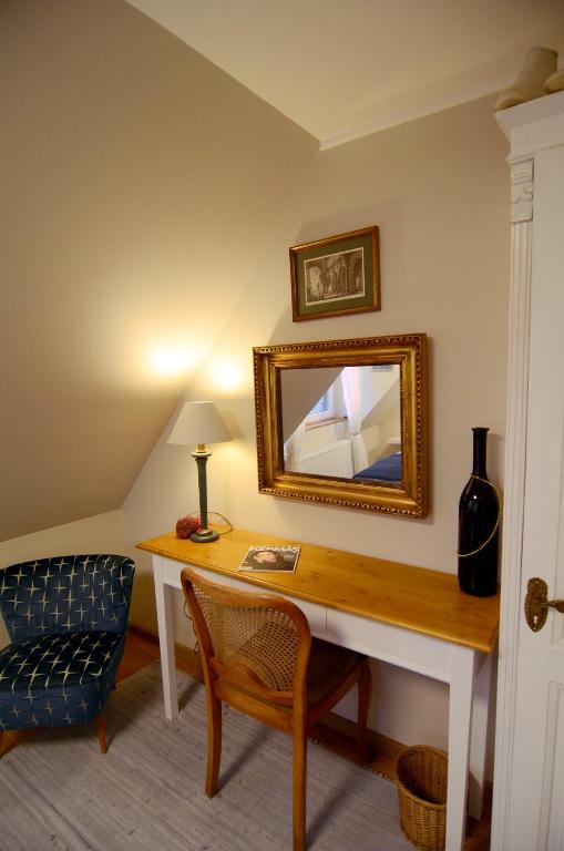 Televízia a/alebo spoločenská miestnosť v ubytovaní Fília Apartman