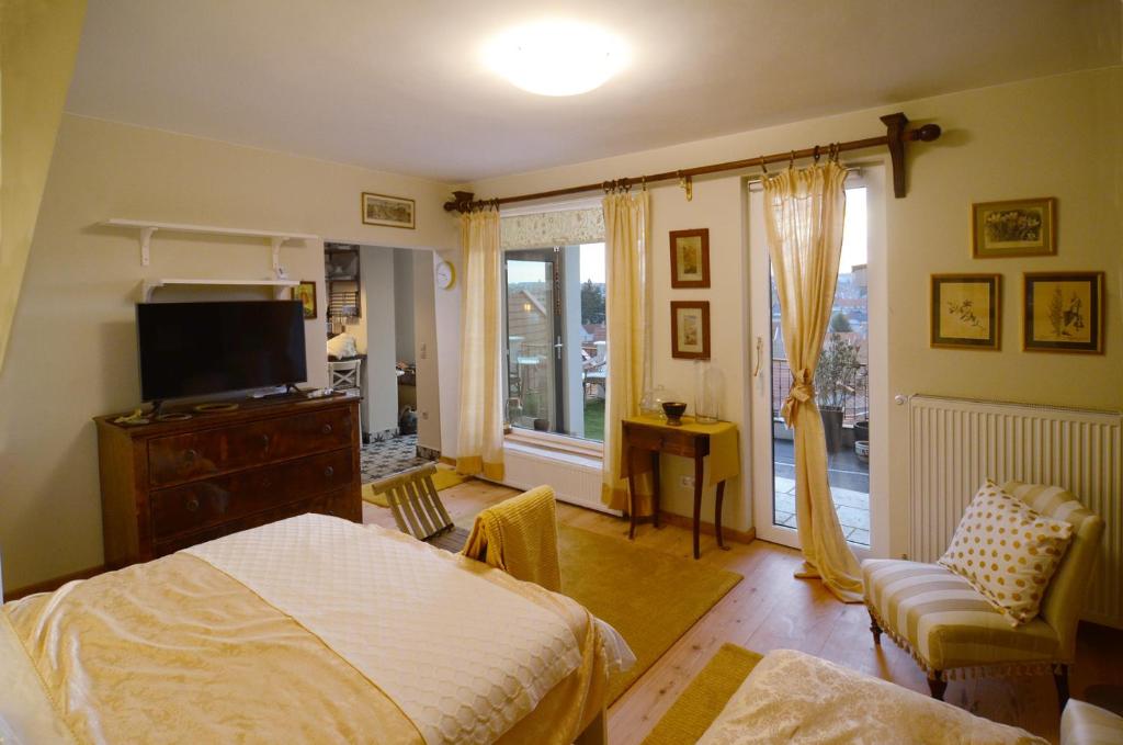 Posteľ alebo postele v izbe v ubytovaní Fília Apartman