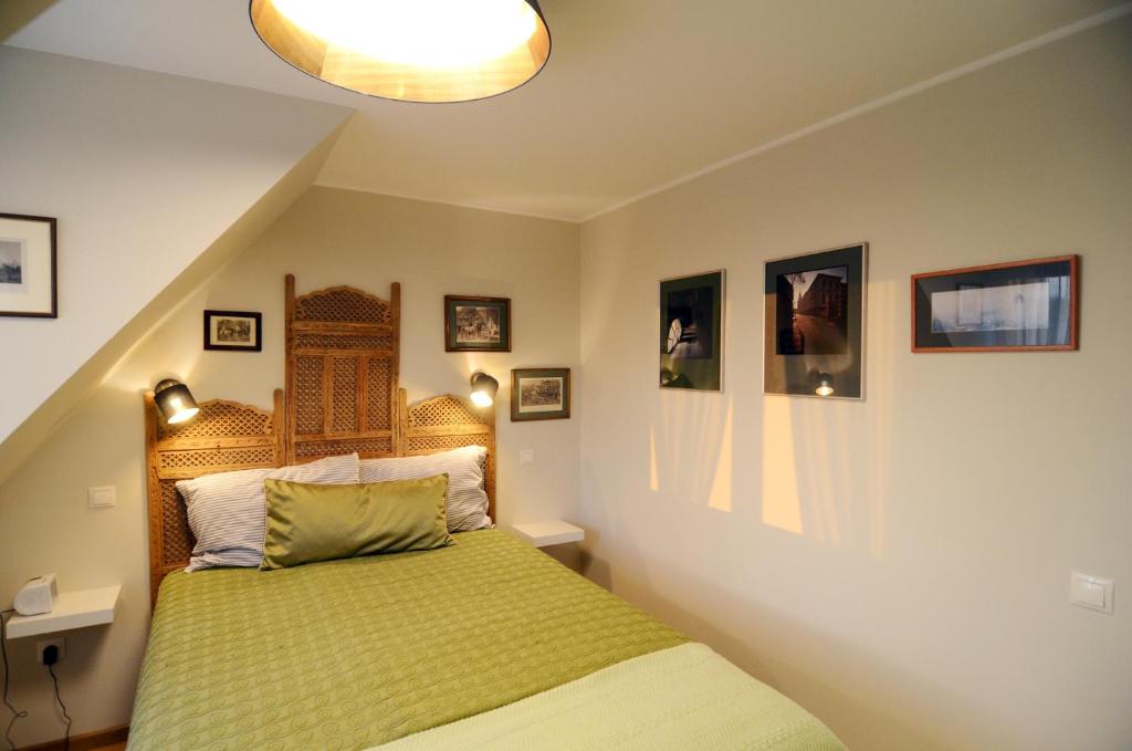 Posteľ alebo postele v izbe v ubytovaní Fília Apartman