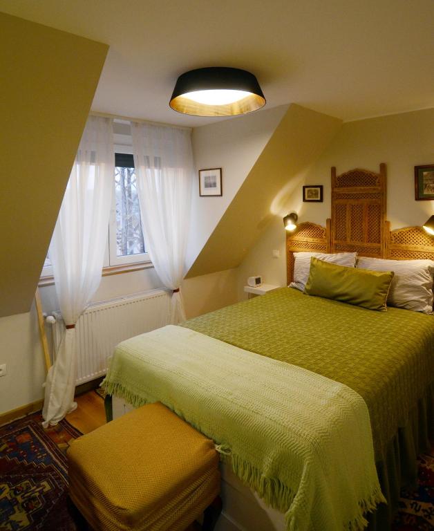 Posteľ alebo postele v izbe v ubytovaní Fília Apartman