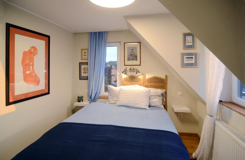 Posteľ alebo postele v izbe v ubytovaní Fília Apartman