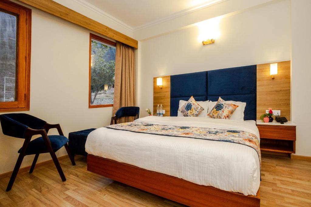 Postel nebo postele na pokoji v ubytování Anand Vardhan Resorts