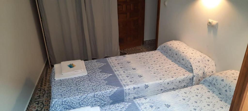 Postel nebo postele na pokoji v ubytování LA CASA MORISCA