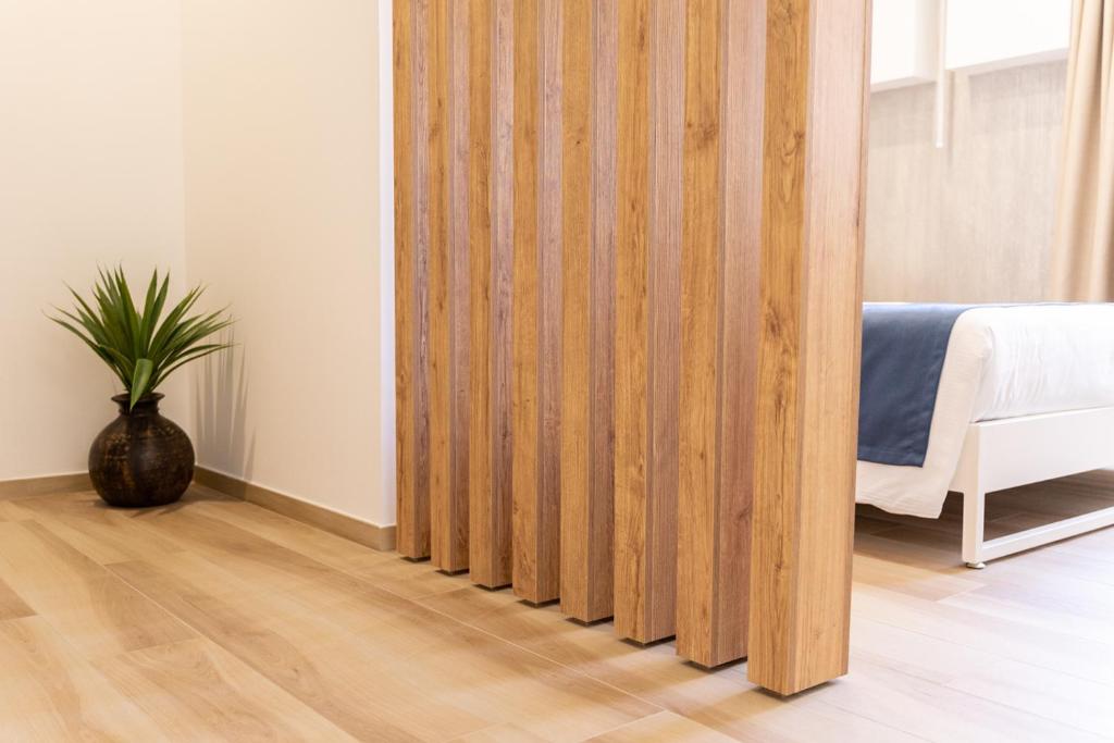 Postel nebo postele na pokoji v ubytování Antonio Busco rooms