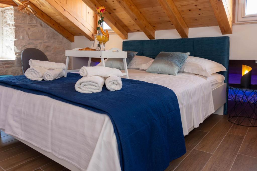 Posteľ alebo postele v izbe v ubytovaní Luxury Rooms Rustic Chic