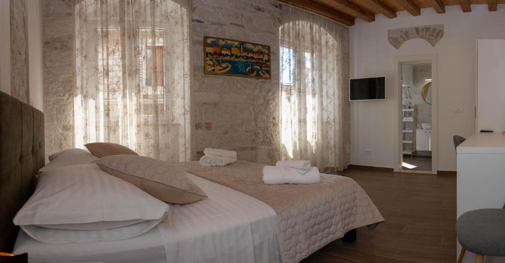 Posteľ alebo postele v izbe v ubytovaní Luxury Rooms Rustic Chic