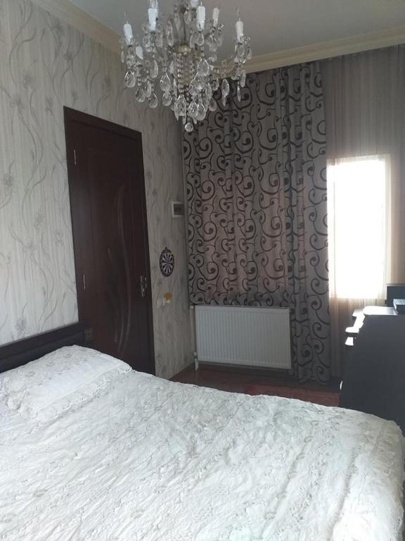 Postel nebo postele na pokoji v ubytování sweethouse