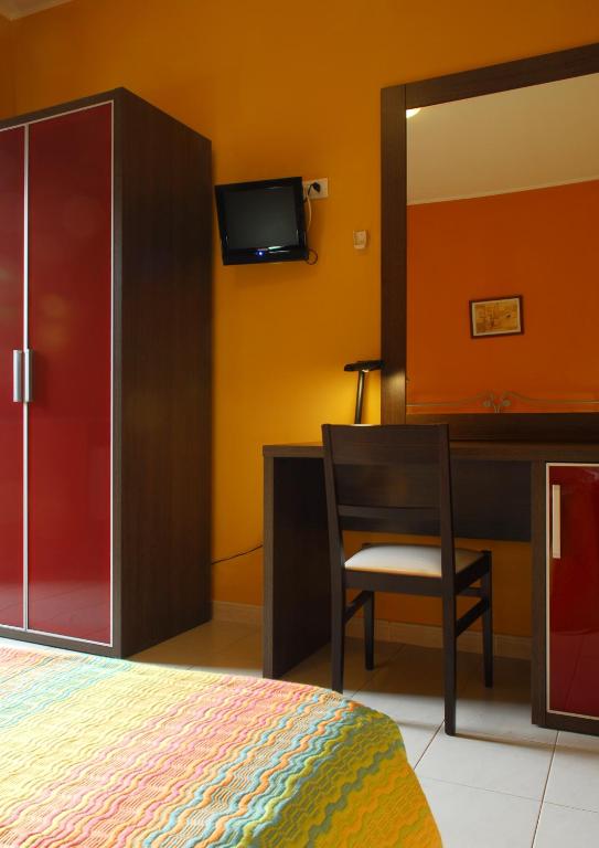 Telewizja i/lub zestaw kina domowego w obiekcie Hotel Michelangelo