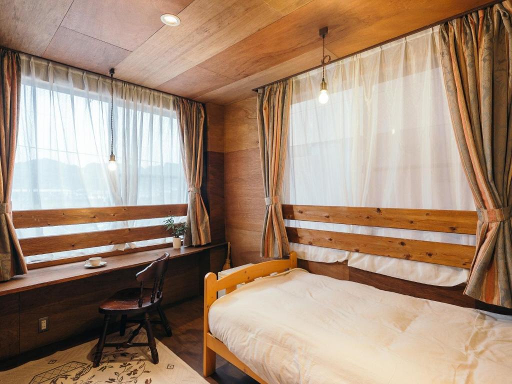 Posteľ alebo postele v izbe v ubytovaní Noasobi Lodge 206- Vacation STAY 45777v