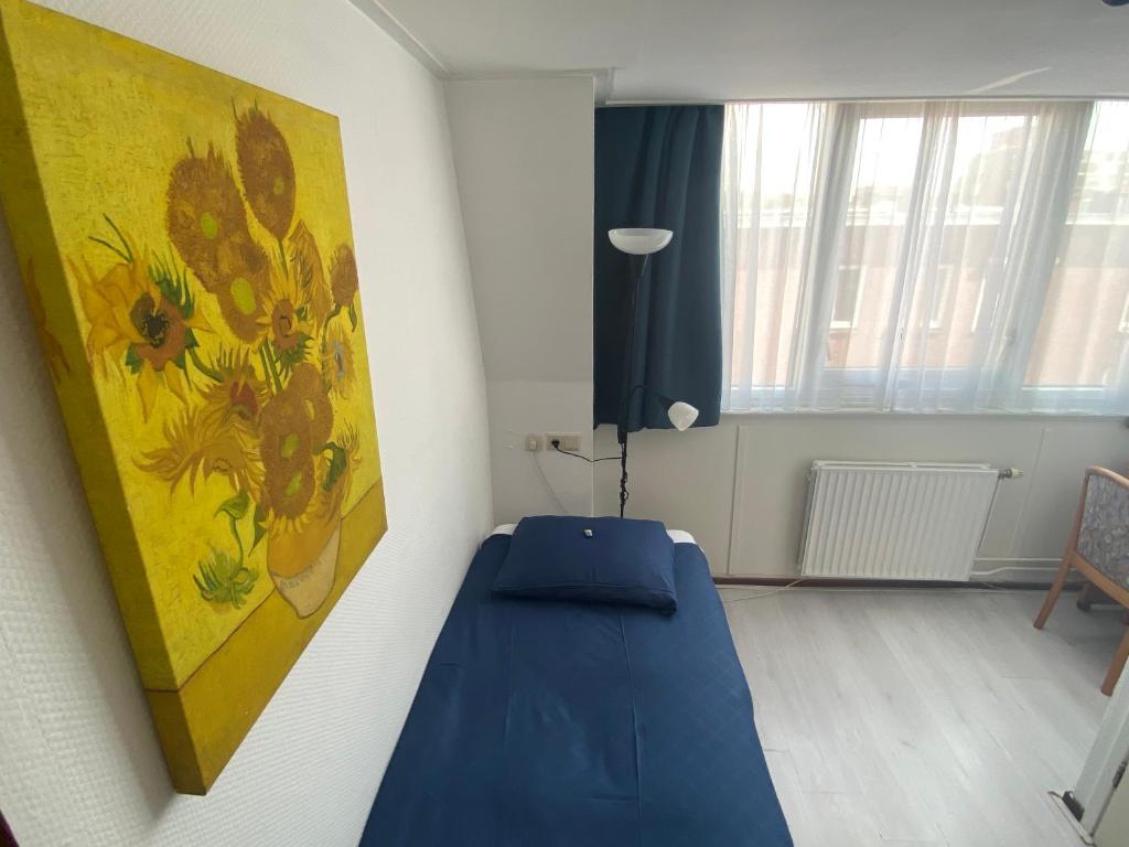Postel nebo postele na pokoji v ubytování Hotel 't Sonnehuys