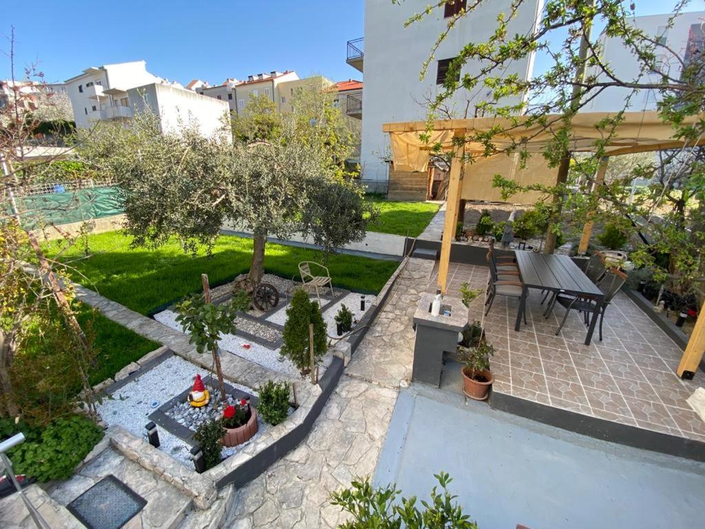 an outdoor patio with a table at Apartment Sunset in Split