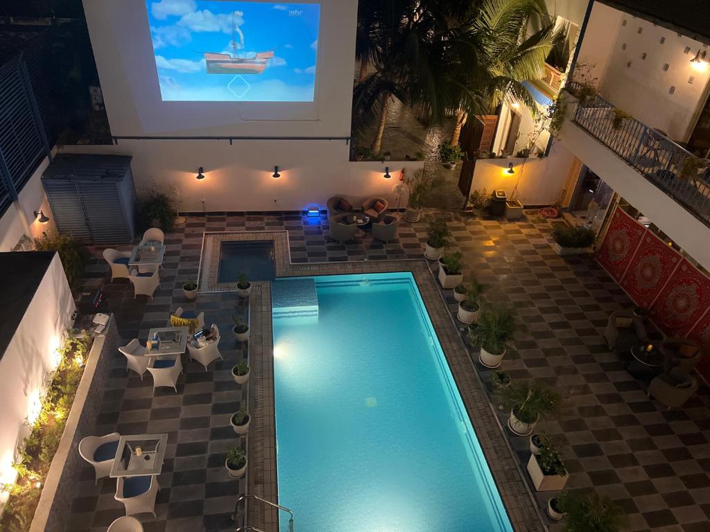 an overhead view of a swimming pool in a building at Il Villaggio Luxury Villas in Jeddah