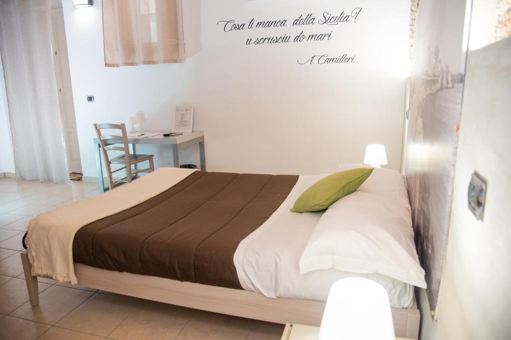 Postel nebo postele na pokoji v ubytování B&B Vicolo IV