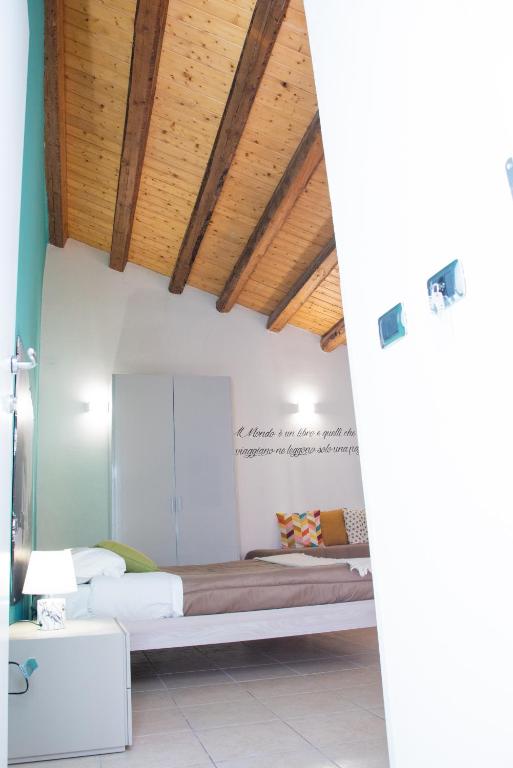 Postel nebo postele na pokoji v ubytování B&B Vicolo IV
