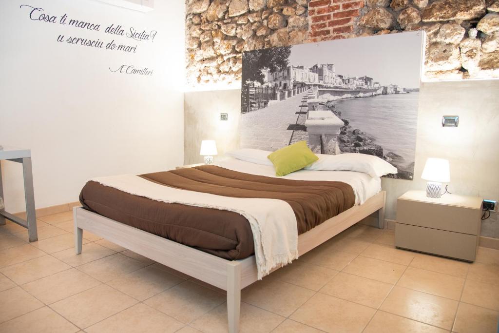 Postel nebo postele na pokoji v ubytování B&B Vicolo IV