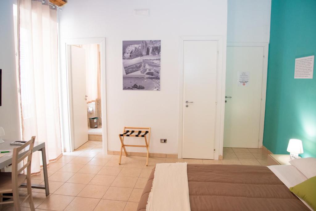 Postel nebo postele na pokoji v ubytování B&B Vicolo IV
