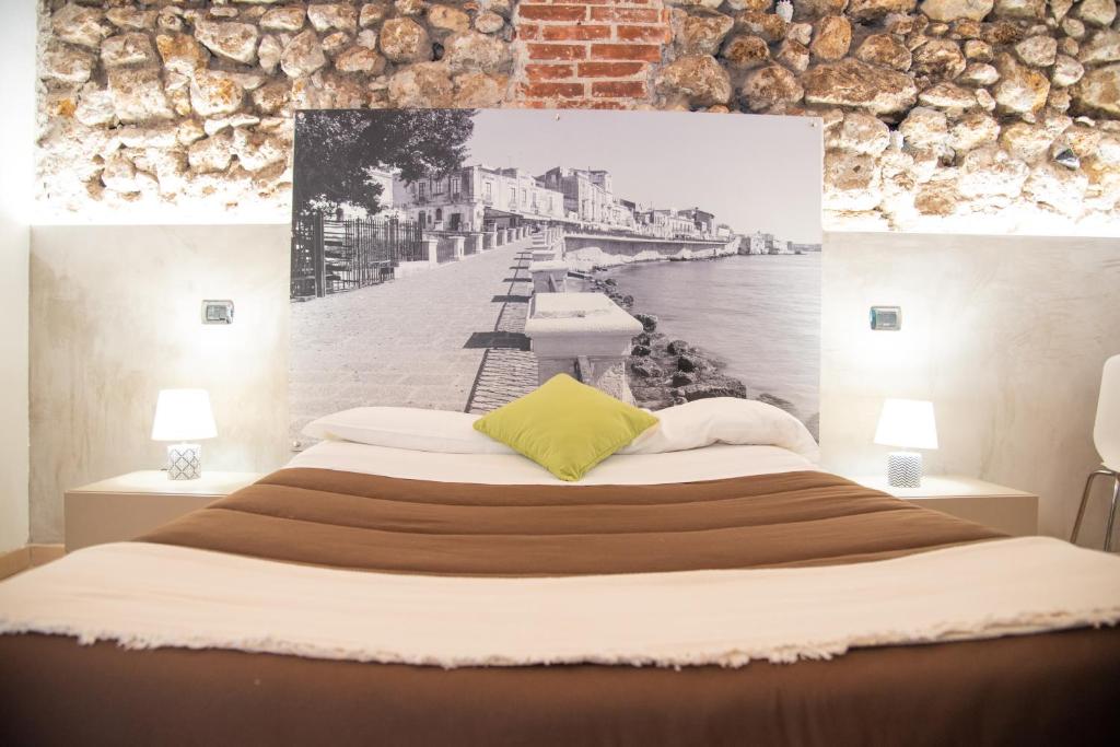 Postel nebo postele na pokoji v ubytování B&B Vicolo IV