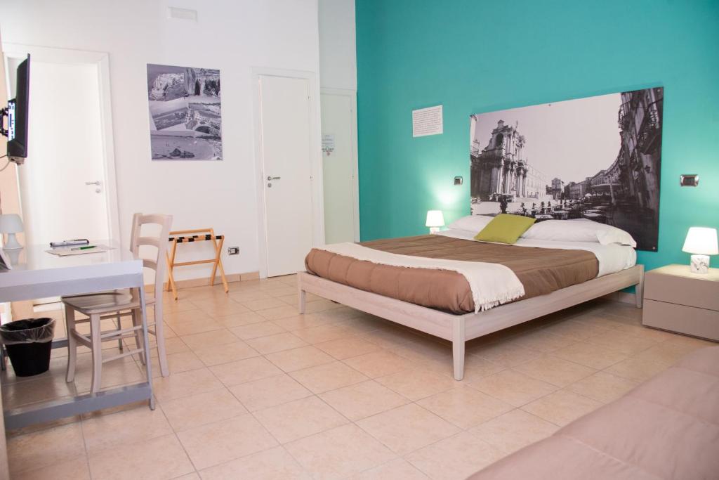 Postel nebo postele na pokoji v ubytování B&B Vicolo IV