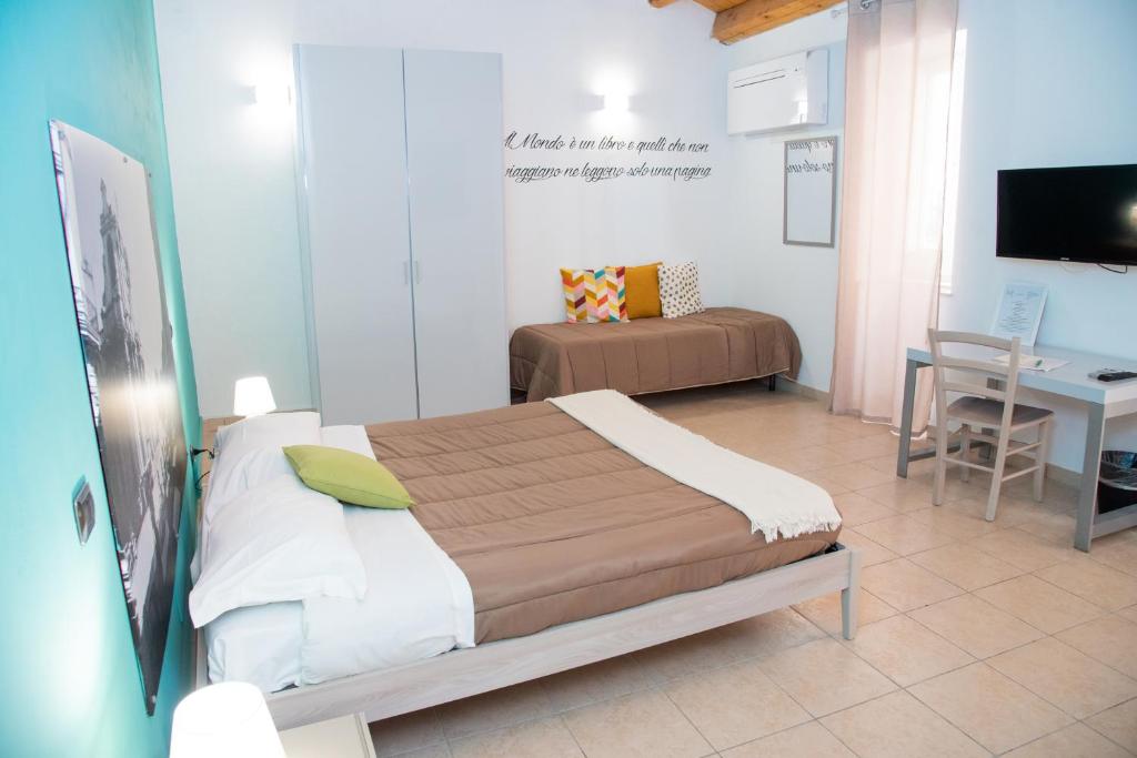 Postel nebo postele na pokoji v ubytování B&B Vicolo IV