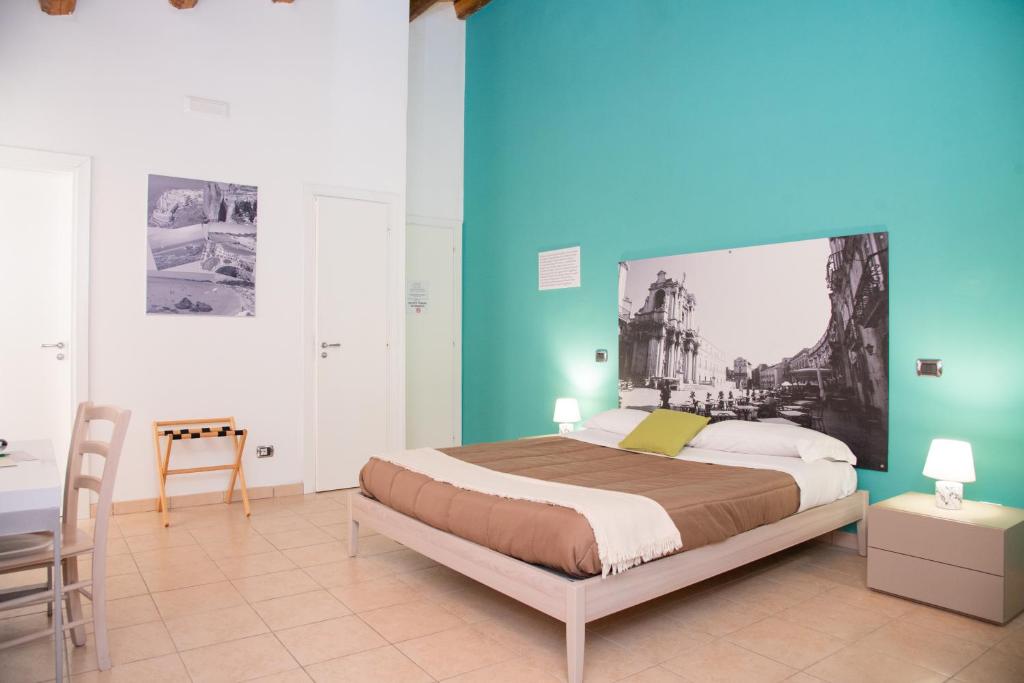 Postel nebo postele na pokoji v ubytování B&B Vicolo IV