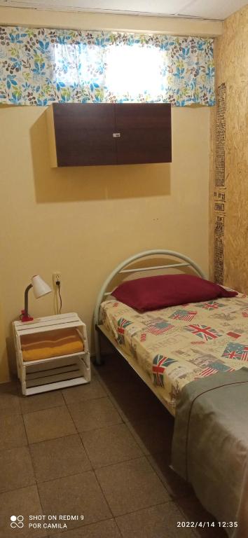 Postel nebo postele na pokoji v ubytování Villa de María