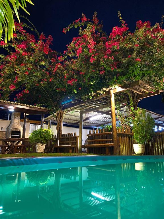 Bazén v ubytování Muriú Beach Flat nebo v jeho okolí