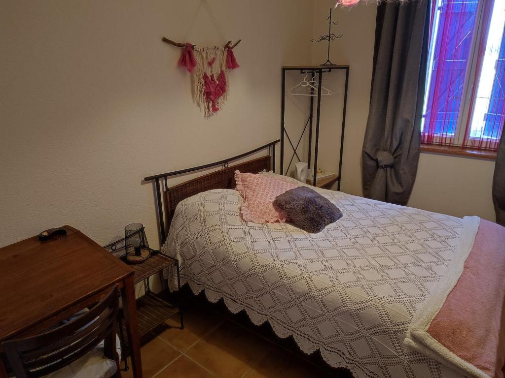 Postel nebo postele na pokoji v ubytování Relais de la poste rez-de-chaussée