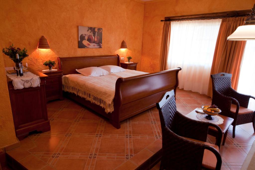 Postel nebo postele na pokoji v ubytování Hotel Villa Lehmi