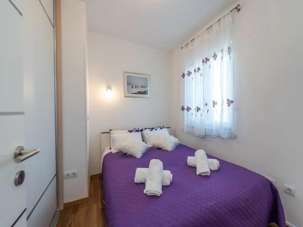 Postel nebo postele na pokoji v ubytování House Ruza