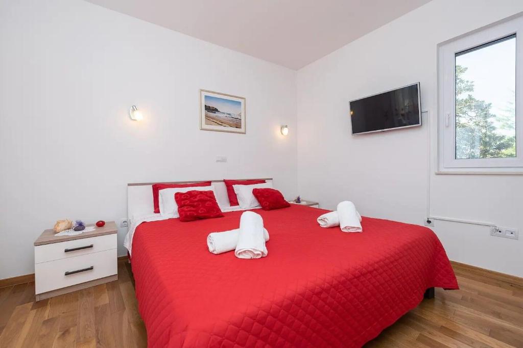 Postel nebo postele na pokoji v ubytování House Ruza