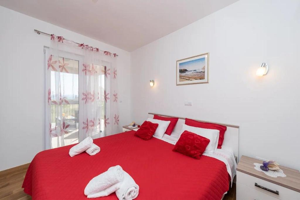 Postel nebo postele na pokoji v ubytování House Ruza